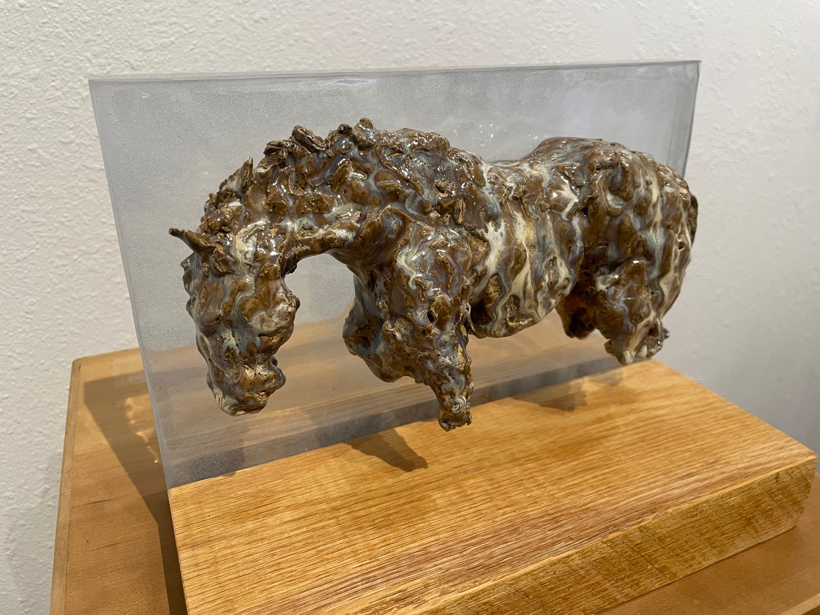 Astronomy — Glazed ceramic, mounted in resin in wood stand by Erica Nordean