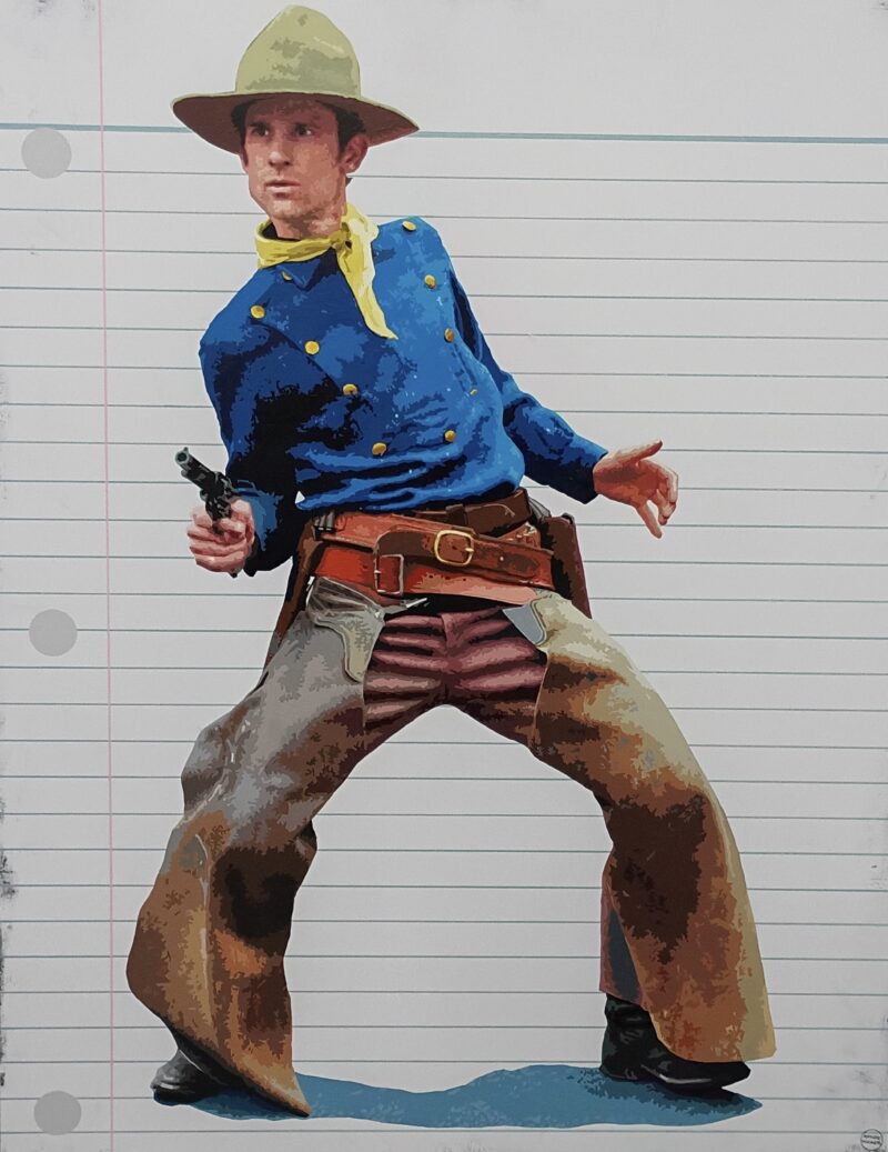 Colorful cowboy posing with gun.